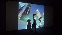 User experiencing the 10.000 moving cities VR application by using a HTC Vive data google at Nam June Paik Art Center Seoul