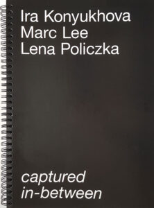 White letters on black book cover: cadaptured in-between