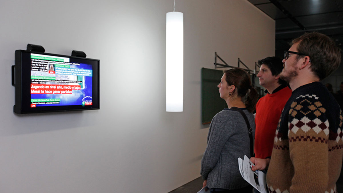 People watching TV Bot in a TV Flatscreen at ZKM Karlsruhe